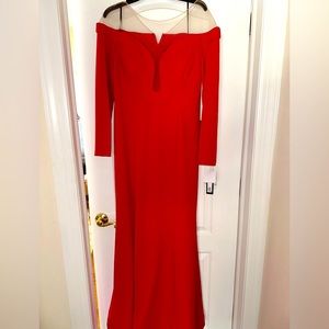 Brand new red dress with sheer mesh in a size 14 from Xscape.